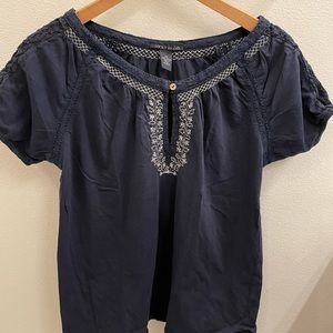 A blue lucky brand t-shirt